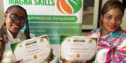 Staff participants receive certificates in recognition of their successful completion of a capacity - building training program in Accra, Ghana.